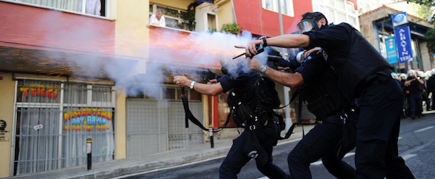 Turkish riot police fire tear gas as they clash with Kurdish demonstrators during a protest in support of a hunger strike movement by Kurdish prisoners, on October 30, 2012, in Istanbul. The justice minister said at least 680 prisoners are currently on a hunger strike in prisons across the country, while Turkey&#8217;s Human Rights Association, which closely follows the country&#8217;s long-simmering Kurdish conflict, said 715 inmates are striking in 48 prisons. Some of the prisoners have been without food for 43 days, and there are fears about their deteriorating condition. Hunger striking protesters have three main demands: the release of imprisoned Kurdish rebel leader Abdullah Ocalan, the right to Kurdish language education and the right to use Kurdish in Turkish courts. AFP PHOTO/BULENT KILIC (Photo credit should read BULENT KILIC/AFP/Getty Images)
