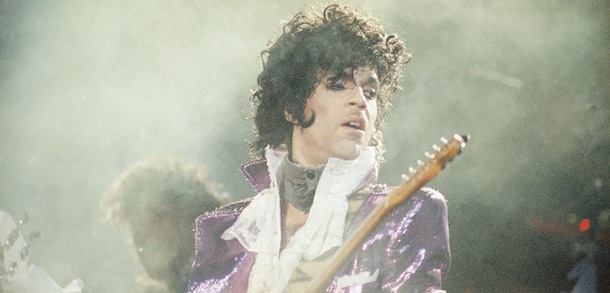 Rock singer Prince performs at the Forum in Inglewood, Calif., during his opening show, Feb. 18, 1985. (AP Photo/Liu Heung Shing)
