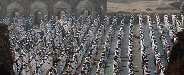 Muslims offer prayer at Ferozshah Kotla mosque during Eid al-Adha in New Delhi, India , Saturday, Oct. 27, 2012. Eid al-Adha is a religious festival celebrated by Muslims worldwide to commemorate the willingness of Prophet Ibrahim to sacrifice his son as an act of obedience to God. (AP Photo/Tsering Topgyal)
