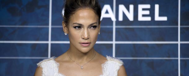 US singer and actress Jennifer Lopez poses during a photocall prior to the Chanel Spring/Summer 2013 ready-to-wear collection show on October 2, 2012 at the Grand Palais in Paris. AFP PHOTO/MARTIN BUREAU (Photo credit should read MARTIN BUREAU/AFP/GettyImages)
