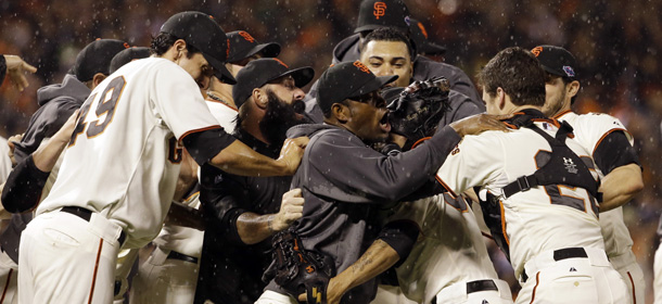 The San Francisco Giants celebrate after the final out in Game 7 of baseball&#8217;s National League championship series against the St. Louis Cardinals Monday, Oct. 22, 2012, in San Francisco. The Giants won 9-0 to win the series. (AP Photo/David J. Phillip)

