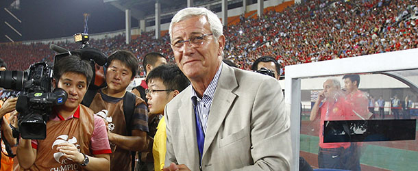 World Cup-winning coach Marcello Lippi arrives in the Guangzhou&#8217;s Tianhe stadium, to lead his new Chinese club Guangzhou Evergrande in the AFC Champions League play-off match against FC Tokyo in Guangzhou on May 30, 2012. Guangzhou beat Tokyo 1-0. AFP PHOTO (Photo credit should read STR/AFP/GettyImages)

