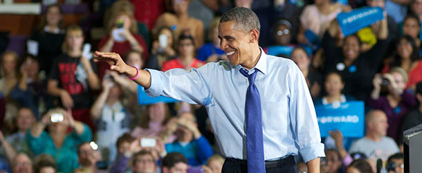MOUNT VERNON, IA &#8211; OCTOBER 17: U.S. President Barrack Obama waves during a rally at the Richard and Norma Small Multi-Sports Center Gym at Cornell College on October 17, 2012 in Mount Vernon, Iowa. President Obama visited the college campus in Iowa, a state that is still very much up for grabs, one day after the second Presidential Debate in order to highlight his plans for moving the country forward. (Photo by David Greedy/Getty Images)

