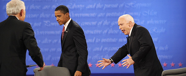 US Republican presidential candidate John McCain (R) and Democrat Barack Obama (C) leave the table after the final presidential debate at Hofstra University in Hempstead, New York, on October 15, 2008 as moderator Bob Schieffer. AFP PHOTO/Emmanuel Dunand (Photo credit should read EMMANUEL DUNAND/AFP/Getty Images)

