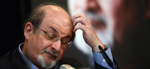 British author Salman Rushdie addresses the press during the presentation of his book &#8220;Joseph Anton&#8221; on October 1, 2012 in Berlin. As violent protests over a US-made film rock the Muslim world, Salman Rushdie publishes his account of the decade he spent in hiding while under a fatwa for his book &#8220;The Satanic Verses&#8221;. AFP PHOTO / JOHANNES EISELE (Photo credit should read JOHANNES EISELE/AFP/GettyImages)
