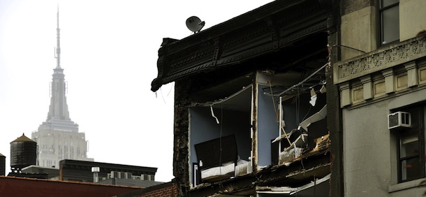 The Empire State Building towers in the background of an apartment buliding in Chelsea, New York City, with the facade broken off October 30, 2012 the morning after Hurricane Sandy. The death toll from superstorm Sandy has risen to 16 in the mainland United States and Canada, and was expected to climb further as several people were still missing, officials said Tuesday. Connecticut, New York, New Jersey, Maryland, Pennsylvania, West Virginia and North Carolina reported 15 dead from the massive storm system, and Toronto police said a Canadian woman was killed by flying debris.
AFP PHOTO / TIMOTHY A. CLARY (Photo credit should read TIMOTHY A. CLARY/AFP/Getty Images)
