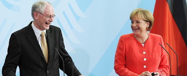 German Chancellor Angela Merkel (R) and EU Council President Herman Van Rompuy laugh during a joint press conference on June 10, 2010 in Berlin. Merkel met Van Rompuy ahead of a summit of the bloc&#8217;s 27 leaders next week. AFP PHOTO / JOHANNES EISELE (Photo credit should read JOHANNES EISELE/AFP/Getty Images)
