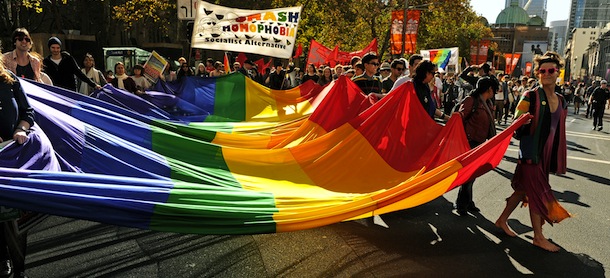 Participants in a pro-marriage equality rally march through the streets of Sydney on May 12, 2012. Australian Attorney-General Nicola Roxon said May 12 she would vote for gay marriage when the chance came later this year and the &#8220;time is coming&#8221; for change, as protesters marched across the nation. AFP PHOTO / Greg WOOD (Photo credit should read GREG WOOD/AFP/GettyImages)
