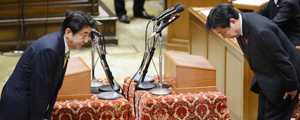 Japanese Prime Minister Yoshihiko Noda (R) bows to President of the main opposition Liberal Democratic Party (LDP) Shinzo Abe (L) before their one-on-one debate at the lower house on November 14, 2012. Noda said on November 14 he will dissolve parliament on November 16 to hold an election if his opponents play ball on reforming the electoral system. AFP PHOTO / Toru YAMANAKA (Photo credit should read TORU YAMANAKA/AFP/Getty Images)
