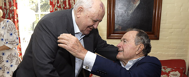 Former President of the Soviet Union Mikhail Gorbachev, left, is greeted by former President George H.W. Bush, right, as the two meet for lunch Thursday, Nov. 1, 2012, in Houston. Gorbachev is in Houston to speak at the Brilliant Lecture Series. (AP Photo/David J. Phillip)
