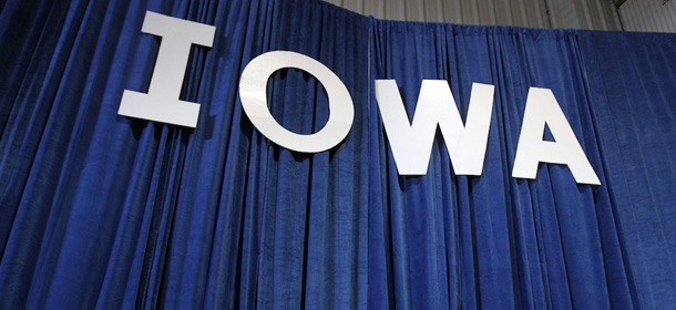 Republican vice presidential candidate, Rep. Paul Ryan&#8217;s, R-Wis., son Sam peaks through a curtain during a campaign rally in Des Moines, Iowa, Monday, Nov. 5, 2012. (AP Photo/Mary Altaffer)
