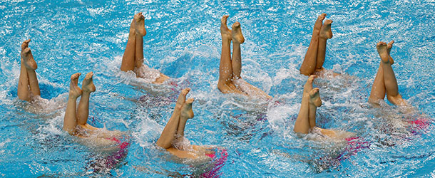 The Democartic People&#8217;s Republic of Korea (DPR Korea) team performs in the Teams Free Routine Syncronised swimming final during the 9th Asian Swimming Championships in Dubai, on November 18, 2012. DPR Korea won the silver medal. AFP PHOTO/MARWAN NAAMANI (Photo credit should read MARWAN NAAMANI/AFP/Getty Images)
