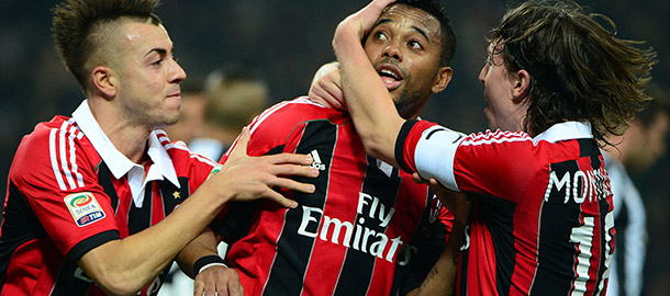 AC Milan&#8217;s Brazilian forward Robinho (C) celebrates after scoring with AC Milan&#8217;s midfielder Riccardo Montolivo (L) and AC Milan&#8217;s forward Stephan El Shaarawy during the Italian serie A football match between AC Milan and Juventus on November 25, 2012 at the San Siro stadium in Milan. AFP PHOTO / OLIVIER MORIN (Photo credit should read OLIVIER MORIN/AFP/Getty Images)
