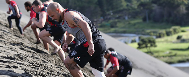 AUCKLAND, NEW ZEALAND &#8211; NOVEMBER 10: Sam Rapira of the Warriors trains on the sand dunes during the New Zealand Warriors NRL training session at Bethells Beach on November 10, 2012 in Auckland, New Zealand. This is their first training session at Bethells since teammate, Sonny Fai&#8217;s disappearance from the beach on January 4, 2009. (Photo by Sandra Mu/Getty Images)
