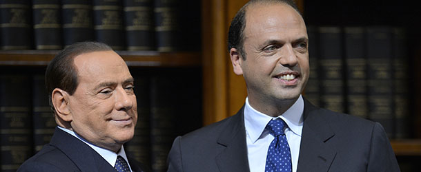 Former Italian Prime Minister Silvio Berlusconi (L) poses with the secretary general of the Popolo della Liberta (PDL) party, Angelino Alfano on May 25, 2012 at the senate in Rome. Berlusconi suggested during a press conference an institutional reform in the Italian institutional system, based on the French presidential one. AFP PHOTO / FILIPPO MONTEFORTE (Photo credit should read FILIPPO MONTEFORTE/AFP/GettyImages)
