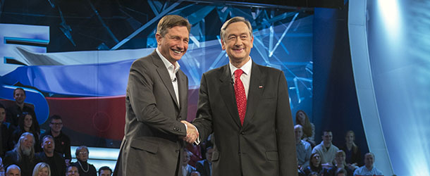 Presidential candidates Borut Pahor (L) and Danilo Turk shake hands prior to the start of the televised debate ahead of the second round of the presidential elections in Ljubljana on November 29, 2012. Slovenia is likely to see pro-austerity former premier Borut Pahor as its next president after his upset first-round election win, but next month&#8217;s run-off hangs on who clinches the backing of the centre-right government. Pahor, whose centre-left government collapsed a year ago, faces a run-off with Turk on December 2, in which centre-right voters will be crucial after the exit of third-placed government favourite Milan Zver. AFP PHOTO/JURE MAKOVEC (Photo credit should read Jure Makovec/AFP/Getty Images)
