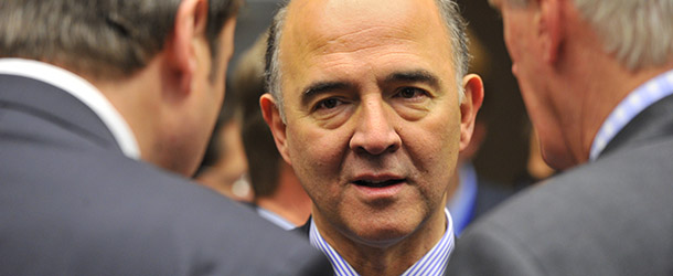 French Minister of Economy, Finances and Foreign Trade Pierre Moscovici (C) talks prior an ECOFIN Council on December 12, 2012 at the EU Headquarters in Brussels. European Union finance ministers try again to nail down an accord on a controversial single supervisor system for the banks, a key step to taming the debt crisis and putting the bloc back on track. AFP PHOTO GEORGES GOBET (Photo credit should read GEORGES GOBET/AFP/Getty Images)
