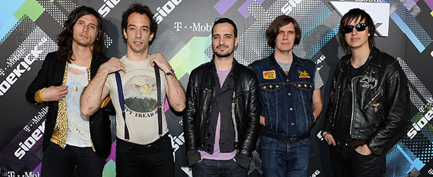 BEVERLY HILLS, CA - APRIL 20: Musicians Nick Valensi, Albert Hammond Jr., Fabrizio Moretti, Nikolai Fraiture and Julian Casablancas of The Strokes arrive at the launch party for the new T-Mobile Sidekick 4G at a Private Lot on April 20, 2011 in Beverly Hills, California. (Photo by Michael Buckner/Getty Images for T-Mobile) *** Local Caption *** Nick Valensi;Albert Hammond Jr.;Fabrizio Moretti;Nikolai Fraiture;Julian Casablancas;
