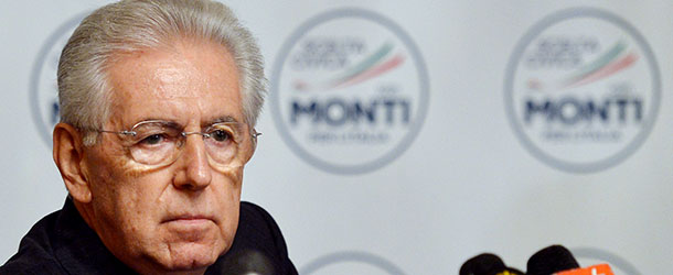 Italian outgoing Prime Minister Mario Monti looks on after unveiling the logo of his new party during a press conference in Rome on January 4, 2013. The coalition of centrist parties led by Monti is currently running in fourth place ahead of early elections in February, according to a poll published on to-day. AFP PHOTO / ALBERTO PIZZOLI (Photo credit should read ALBERTO PIZZOLI/AFP/Getty Images)
