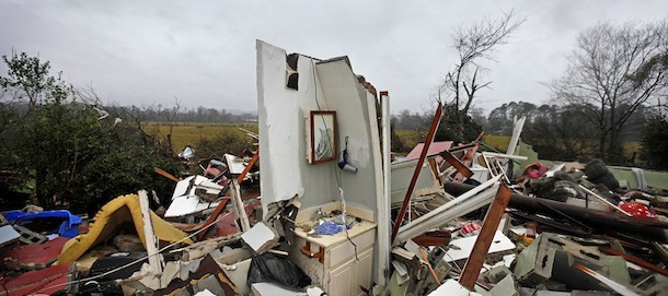 The remnants of a bathroom stand amidst the wreckage of a destroyed home after a tornado struck, Wednesday, Jan. 30, 2013, in Adairsville, Ga. A fierce storm system that roared across Georgia has left at least one person dead after it demolished buildings and flipped vehicles on Interstate 75 northwest of Atlanta. (AP Photo/David Goldman)