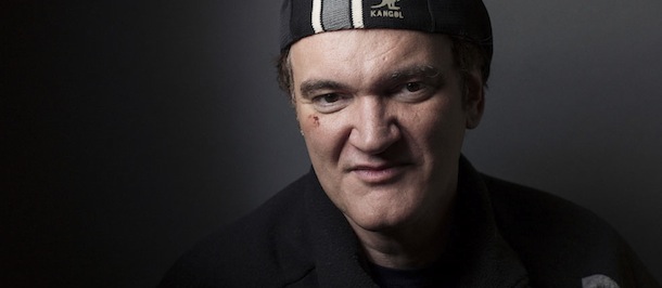 In this Sunday, Dec. 16, 2012 photo, director Quentin Tarantino poses in New York for a portrait in promotion of "Django Unchained." The film, starring Jamie Foxx, Kerry Washington, Don Johnson and Christoph Waltz, centers on a slave trying to rescue his wife from a Mississippi plantation. (Photo by Victoria Will/Invision/AP)