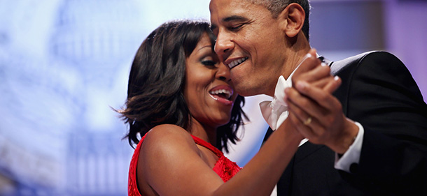 WASHINGTON, DC - JANUARY 21: U.S. President Barack Obama and first lady Michelle Obama sing together as they dance during the Inaugural Ball at the Walter Washington Convention Center January 21, 2013 in Washington, DC. Obama was sworn-in for his second term of office earlier in the day. (Photo by Chip Somodevilla/Getty Images)