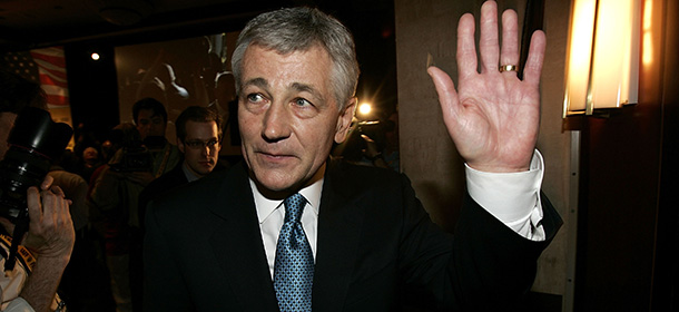 WASHINGTON - MARCH 14: U.S. Sen. Chuck Hagel (R-NE) acknowledges the crowd after speaking to members of the International Association of Fire Fighters (IAFF) during a bipartisan presidential forum March 14, 2007 in Washington, DC. Also participating in the forum were Democrats Hillary Rodham Clinton, John Edwards and Barak Obama and fellow Republican Sen. John McCain. Former New York City Mayor Rudolph Giuliania, a Republican, declined to attend citing scheduling conflicts. (Photo by Alex Wong/Getty Images) *** Local Caption *** Chuck Hagel