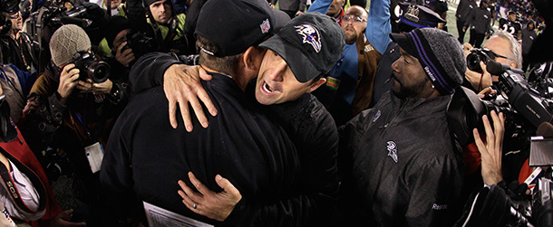 BALTIMORE, MD - NOVEMBER 24: Head coach Jim Harbaugh of the San Francisco 49ers (L) hugs his brother head coach John Harbaugh of the Baltimore Ravens (R) after the Ravens defeated the 49ers 16-6 at M&amp;T Bank Stadium on November 24, 2011 in Baltimore, Maryland. (Photo by Rob Carr/Getty Images)
