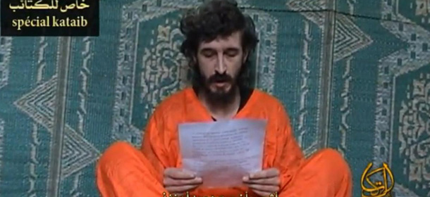 FILE- In this undated file image from a video posted on islamic militant websites and made available Wednesday June 9 2010, a man identified as French security agent Denis Allex pleads for his release from the Somali militant group al-Shabaab who have been holding him for nearly a year. A French commando raid in Somalia to free a captive intelligence agent ended in the deaths of 17 Islamists and a French soldier. France said the hostage also died in the failed rescue, but the man's captors denied he had been killed and claimed Saturday, Jan. 12, 2013, to have seized a second soldier. (AP Photo, File)