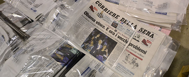 Newspapers are beign packed during the printing of the edition of the November 8, 2012 of the "Corriere della Sera" with its frontpage on the results of the US presidential election on November 8, 2012 at the newspaper printing house in Milan. Founded in 1876, the Corriere della Sera is one of the main Italian daily newpspaper, with its offices located Via Solferino in Milan, in the same buildings since the beginning of the 20th century. AFP PHOTO / GIUSEPPE CACACE (Photo credit should read GIUSEPPE CACACE,GIUSEPPE CACACE/AFP/Getty Images)