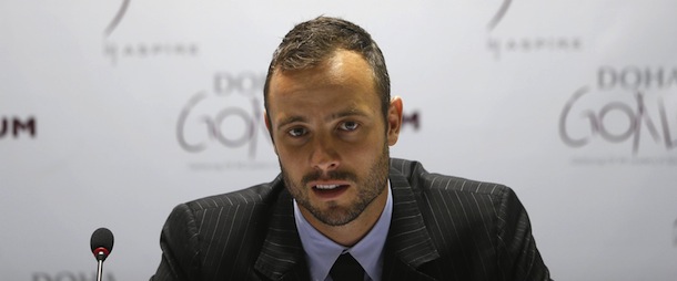 Paralympic and Olympic runner Oscar Pistorius of South Africa speaks during a news conference after the official opening ceremony of the Gathering Of All Leaders In Sport (GOALS) forum in the Qatari capital Doha, on December 11, 2012. AFP PHOTO /KARIM JAAFAR / AL-WATAN DOHA == QATAR OUT (Photo credit should read KARIM JAAFAR/AFP/Getty Images)
