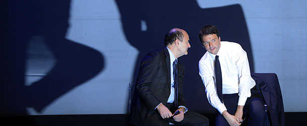 Democratic Party (PD) secretary general Pierluigi Bersani (L) and Florence's mayor Matteo Renzi chat on stage during an electoral rally on February 1, 2013 in Florence. Italians take to the polls on February 24-25. AFP PHOTO / ANDREAS SOLARO (Photo credit should read ANDREAS SOLARO,ANDREAS SOLARO/AFP/Getty Images)