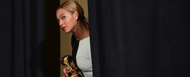 Singer Beyonce poses in the press room at the Staples Center during the 55th Grammy Awards in Los Angeles, California, February 10, 2013. AFP PHOTO Robyn BECK (Photo credit should read ROBYN BECK/AFP/Getty Images)