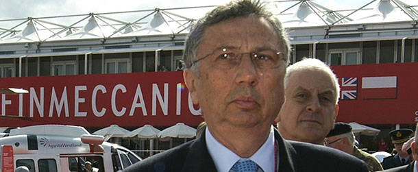 (FILES) This file picture taken on July 11, 2012 shows the President and CEO of Finnmeccanica Giuseppe Orsi at the Finnmeccanica exhibition stand at the Farnborough International Airshow in Hampshire, southern England. India on February 15, 2013 said it had started the process of cancelling a 748-million US dollar deal for 12 Italian helicopters amid allegations that the contract was won through kickbacks. The ministry of defence said in a statement it had "initiated action for cancellation of contract for procurement of 12 AW101 (AgustaWestland) helicopters for the use of VVIPs". AFP PHOTO / ADRIAN DENNIS /FILES (Photo credit should read ADRIAN DENNIS/AFP/Getty Images)