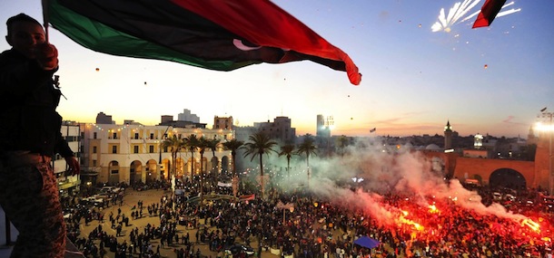 Thousands of Libyans celebrate the second anniversary of the Libyan uprising at Martyrs square on February 17, 2013 in Tripoli. Security forces were on high alert across Libya as the north African nation marked two years since the start of the revolt that toppled Moamer Kadhafi after four decades of iron rule. The anniversary of the uprising that ended with Kadhafi's killing in October 2011 comes as Libya's new rulers battle critics calling for a "new revolution" and accusing them of failing to usher in much-needed reforms. 
AFP PHOTO/MAHMUD TURKIA (Photo credit should read MAHMUD TURKIA/AFP/Getty Images)