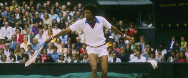 Arthur Ashe runs for the ball during a match at Wimbledon in England.