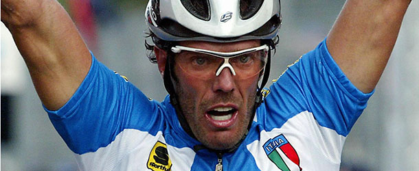 ZOLDER, BELGIUM: (FILES) This piture taken 13 October 2002 in Zolder shows Italy's Mario Cipollini exulting on the finish line of the Elite Men race of the Road Cycling World Championships. Italian sprinter Mario Cipollini has announced what could be his real retirement from cycling 26 April 2005 a fortnight before the start of the Giro d'Italia. AFP PHOTO FRANCK FIFE (Photo credit should read FRANCK FIFE/AFP/Getty Images)