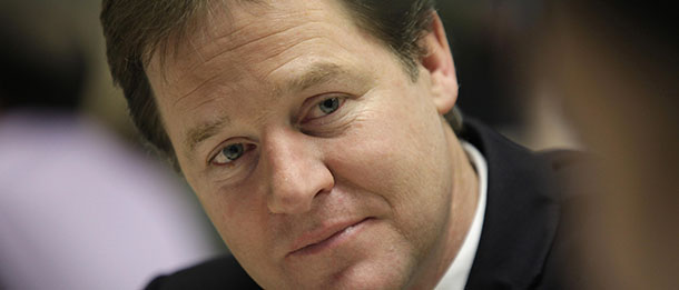 Britain's Deputy Prime Minister Nick Clegg, joins staff in a training session at the McDonald's Training Center, in north London, Tuesday, Jan. 24, 2012. Fast food giant McDonald's announced Tuesday it will create at least 2,500 new UK jobs this year. The burger chain expects more than a half of the new posts to go to young people and around 30 percent to first-time workers.(AP Photo/Lefteris Pitarakis, pool)