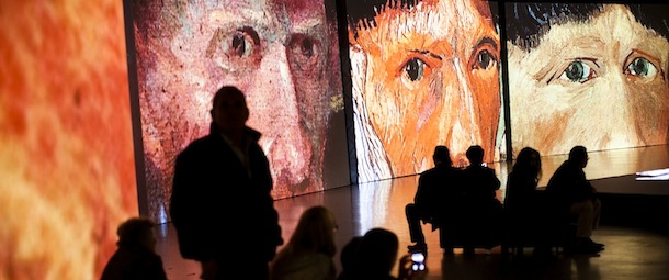 Israelis visit the multimedia exhibition of Vincent Van Gogh's work, "Van Gogh Alive," in Tel Aviv, Israel, Sunday, Feb. 3, 2013. (AP Photo/Oded Balilty)