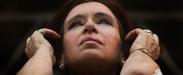 New Argentine president Cristina Fernandez de Kirchner gestures in the stage in front of the Government house 10 December, 2007. Fernandez de Kirchner, 54, was Monday sworn in as the first woman president of Argentina before the two chambers of Congress, after sweeping the polls in October elections to replace her husband Nestor Kirchner. AFP PHOTO / Maxi FAILLA (Photo credit should read Maxi Failla/AFP/Getty Images)