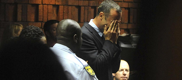 Athlete Oscar Pistorius weeps in court in Pretoria, South Africa, Friday, Feb 15, 2013, at his bail hearing in the murder case of his girlfriend Reeva Steenkamp. Oscar Pistorius arrived at a courthouse Friday, for his bail hearing in the murder case of his girlfriend as South Africans braced themselves for the latest development in a story that has stunned the country. The Paralympic superstar was earlier seen leaving a police station in a dark suit with a charcoal gray jacket covering his head as he got into a police vehicle. Model Reeva Steenkamp was shot and killed at Pistorius' upmarket home in an eastern suburb of the South African capital in the predawn hours of Thursday. (AP Photo/Antione de Ras - Independent Newspapers Ltd South Africa) SOUTH AFRICA OUT