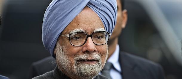 Indian Prime Minister Manmohan Singh speaks to the media at Parliament in New Delhi on February 21, 2013. India's premier urged lawmakers to engage in "responsible" debate as the government seeks to push the annual budget and controversial economic reforms to spur the economy through parliament. Prime Minister Manmohan Singh's appeal came as parliament was to begin a new session in which the government is due to announce next week a budget expected to feature the most belt-tightening in years despite elections looming in 2014. AFP PHOTO/ Prakash SINGH (Photo credit should read PRAKASH SINGH/AFP/Getty Images)
