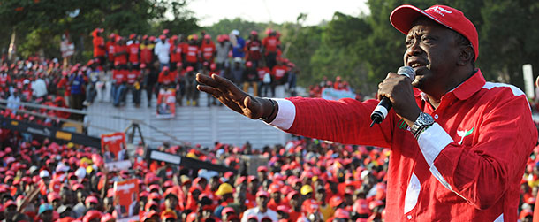 Kenya's Deputy Prime Minister and The National Alliance (TNA) presidential candidate Uhuru Kenyatta addresses party surppoters during a rally on March 2, 2013 in Nairobi on the last day of campaigning, 48 hours ahead of presidential, gubernatorial and senatorial elections. AFP PHOTO/SIMON MAINA (Photo credit should read SIMON MAINA/AFP/Getty Images)