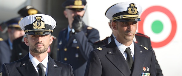 (FILES) This file picture taken on December 22, 2012 shows Italian marines Massimiliano Latorre (R) and Salvatore Girone (L) arriving at Ciampino airport near Rome. The Italian foreign ministry on March 11, 2013 said the two Italian marines accused of killing two Indian fishermen they mistook for pirates would not return to India when their court-allowed leave runs out at the end of this month. AFP PHOTO / FILES / VINCENZO PINTO (Photo credit should read VINCENZO PINTO/AFP/Getty Images)