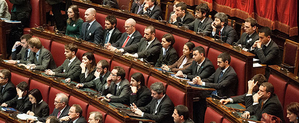 ROME, ITALY - MARCH 16: Deputies of Five Stars Movement listen at Laura Boldrini (not in pictures) as she gives a speech after being nominated the new President of the Chambers of Deputies during the second meeting of the new Italian Parliament on March 16, 2013 in Rome, Italy. The new Italian parliament, which opens the 17th Legislature, has the task of electing the President of the House of Parliament and of the Senate, before giving way to a new government. (Photo by Giorgio Cosulich/Getty Images)