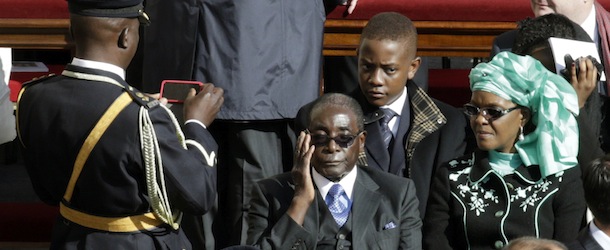 Zimbabwean President Robert Mugabe sits in St. Peter's Square to attend Pope Francis' inaugural Mass, at the Vatican, Tuesday, March 19, 2013. (AP Photo/Andrew Medichini)