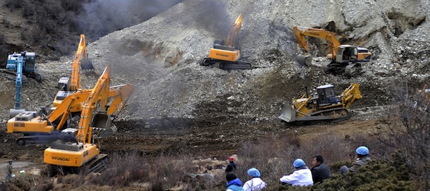 (130329) -- LHASA, March 29, 2013 (Xinhua) -- Photo taken on March 29, 2012 shows the scene where a large-scale landslide hit a mining area in Maizhokunggar County of Lhasa, southwest China's Tibet Autonomous Region. Dozens of workers from a subsidiary of China National Gold Group Corporation were trapped. The exact number of trapped workers were not immediately known. (Xinhua/Chogo) (zc)
