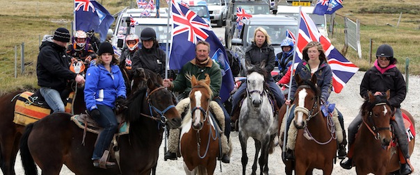 Islanders take part in the "Proud to be British" parade along Ross Road in Port Stanley, Falkland (Malvinas for Argentina) Islands, on March 10, 2013. Falkland Islanders were to vote Monday on the final day of a two-day referendum designed to make clear their staunch desire to remain British despite Argentina's increasingly bellicose sovereignty claims. (Photo credit should read TONY CHATER/AFP/Getty Images)