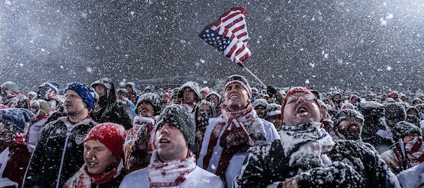 COMMERCE CITY, CO - MARCH 22: Fans of the United States national team cheer, wave a flag, and sing as snow falls during a FIFA 2014 World Cup Qualifier match between Costa Rica and United States at Dick's Sporting Goods Park on March 22, 2013 in Commerce City, Colorado. (Photo by Dustin Bradford/Getty Images)