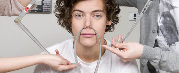 UNSPECIFIED LOCATION - UNSPECIFIED DATE: In this handout image provided by Madame Tussauds, Harry Styles of One Direction poses with calipers during a figure sitting where he is measured for a wax figure creation. Madame Tussauds announced March 11, 2013 that the world famous wax attraction will immortalize the band by creating five individual wax figures of each member. The figures are being created in full cooperation with the band and will be part of a traveling exhibit that will launch in London on April 18 before traveling to New York, July 19 - October 11, and Sydney, October 24 - January 28. (Photo by Madame Tussauds via Getty Images)